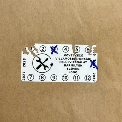 VOID nyomot hagyó 6 éves (2027-2032) kétnyelvű felülvizsgálati biztonsági matrica, 50x25 mm, fehér
