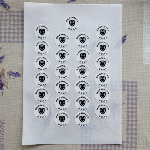 "SECURITY SEAL" VOID nyomot hagyó biztonsági matrica 25 mm kör, matt fehér