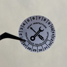   VOID nyomot hagyó 6 éves (2027-2032) kétnyelvű felülvizsgálati matrica 30 mm kör, matt ezüst