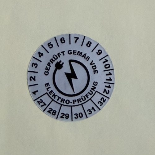 VOID nyomot hagyó 6 éves VDE (2027-2032) felülvizsgálati biztonsági matrica 30 mm kör, matt ezüst