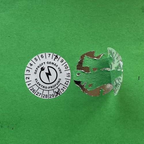 VOID nyomot hagyó 6 éves VDE (2026-2031) felülvizsgálati biztonsági matrica 30 mm kör, matt ezüst