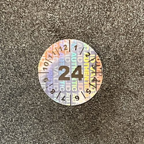 Annual (2024) review hologram sticker, 20 mm circle