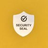 "SECURITY SEAL" VOID nyomot hagyó biztonsági matrica 25x30 mm pajzs forma, matt ezüst
