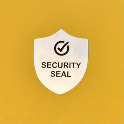 "SECURITY SEAL" VOID nyomot hagyó biztonsági matrica 25x30 mm pajzs forma, matt ezüst