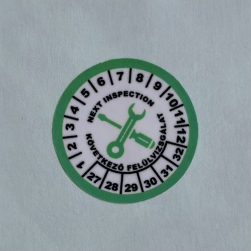 VOID nyomot hagyó 6 éves (2027-2032) felülvizsgálati biztonsági matrica zöld/fekete nyomtatással, 30 mm kör, matt fehér