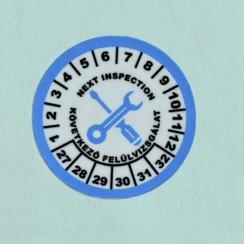 VOID nyomot hagyó 6 éves (2027-2032) felülvizsgálati biztonsági matrica kék/fekete nyomtatással, 30 mm kör, matt fehér
