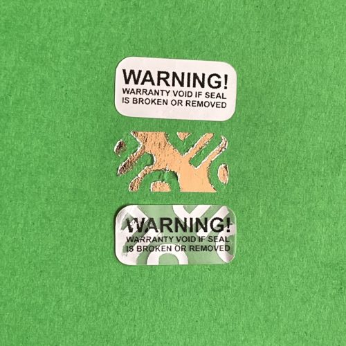 "WARNING" VOID nyomot hagyó biztonsági matrica 20x10 mm, matt ezüst