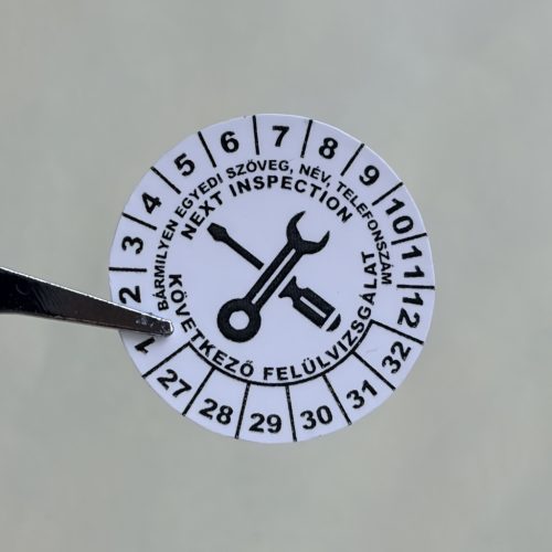 VOID nyomot hagyó 6 éves (2027-2032) felülvizsgálati biztonsági matrica, fekete nyomtatással, 30 mm kör, matt fehér
