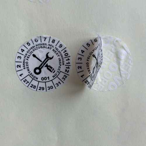 VOID nyomot hagyó 6 éves (2027-2032) felülvizsgálati biztonsági matrica, fekete nyomtatással, 30 mm kör, matt fehér