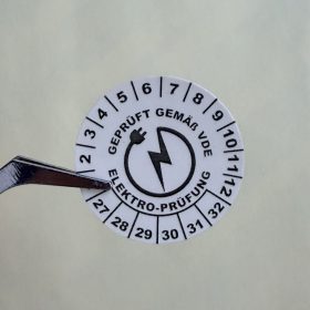   VOID nyomot hagyó 6 éves (2027-2032) VDE felülvizsgálati matrica 30 mm kör, matt fehér