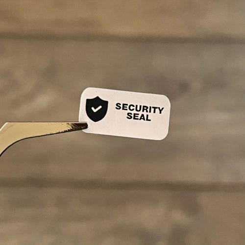 "SECURITY SEAL" VOID nyomot hagyó biztonsági matrica 20x10 mm, matt ezüst