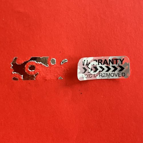 "WARRANTY VOID IF REMOVED" VOID nyomot hagyó biztonsági matrica 30x12 mm, matt ezüst