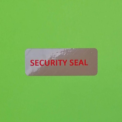 "SECURITY SEAL" fényes ezüst biztonsági matrica 40x18 mm piros nyomtatással